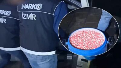 İzmir'in Karşıyaka ilçesinde düzenlenen uyuşturucu operasyonunda park halindeki kamyonette 412