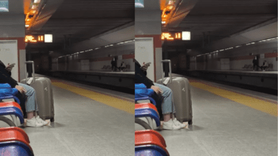 Şirinyer İZBAN durağında, bir kişinin sigara yasağına aldırış etmeden sigara