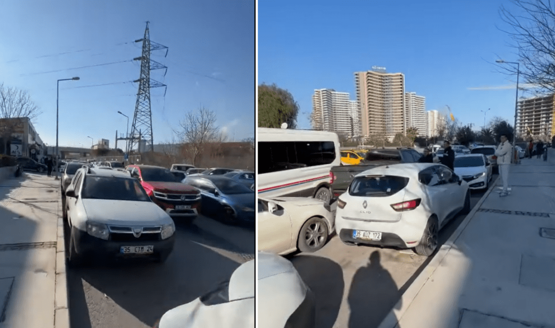 İzmir’de bir özel hastanenin önündeki gidiş-geliş iki şeritli yolda, araçların