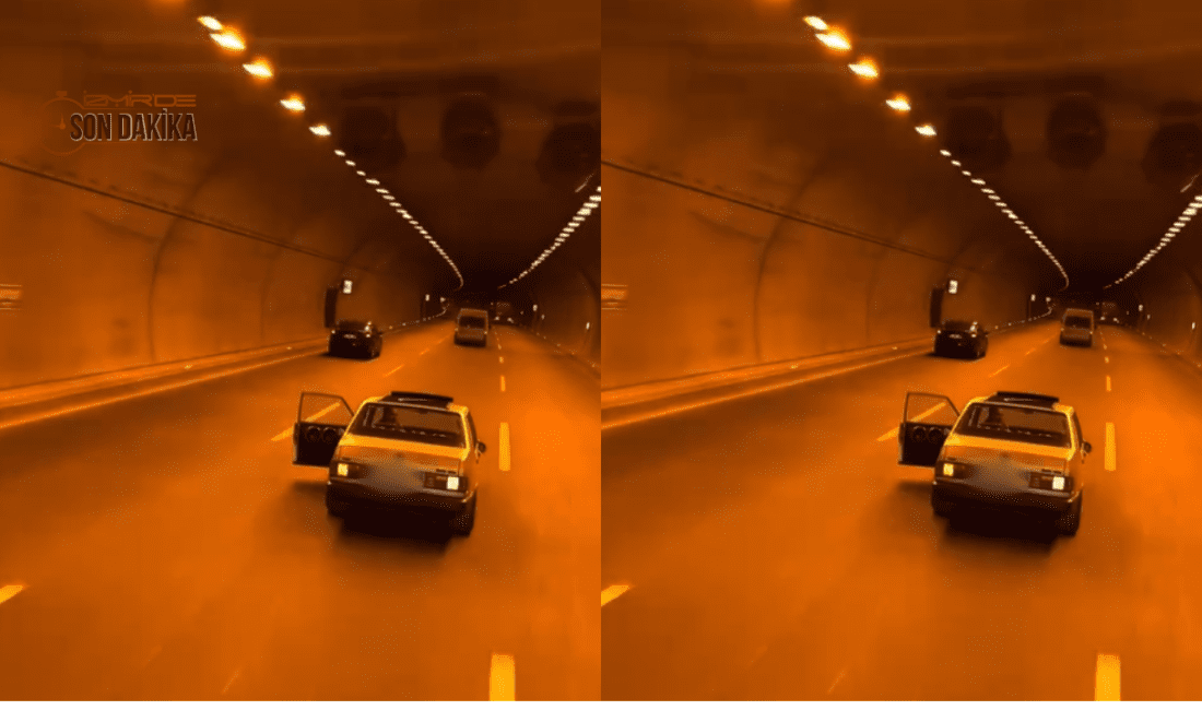 İzmir Kemalpaşa Tünelleri içerisinde bir araç, açık kapı ile trafikte